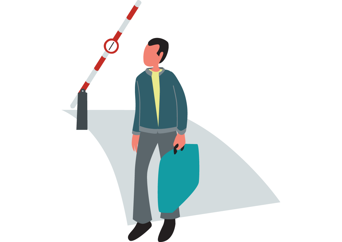 Person with suitcase standing in front of an open barrier